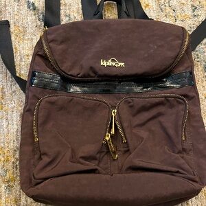 Kipling small backpack purse in dark brown